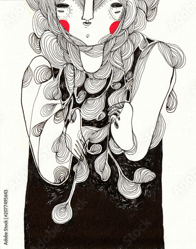 A girl holding black and white lines