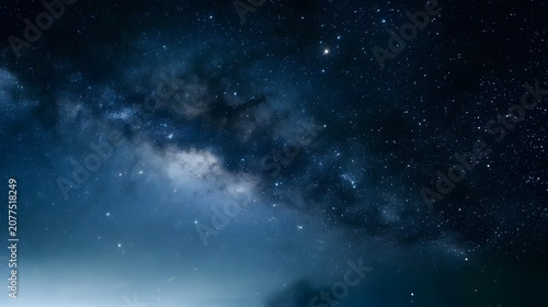 An ethereal and colorful nebula illuminates a starlit night sky creating a deep sense of cosmic depth and emotion