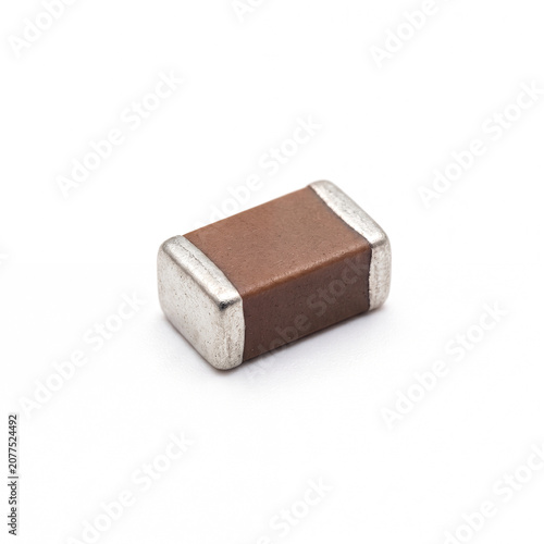 Generic SMD multilayer ceramic capacitor isolated on white.