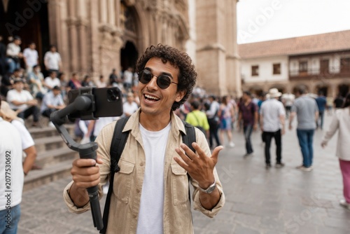 Tourist with camera exploring old town