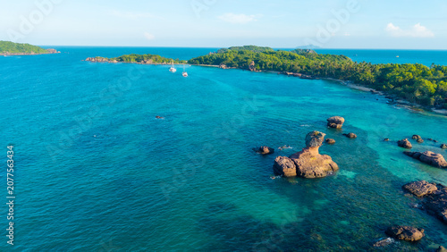 Obraz na plátně Aerial view of beautiful landscape, tourism boats, and people swimming on the se
