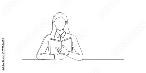Continuous one line drawing of a young woman sitting at a desk and reading a book