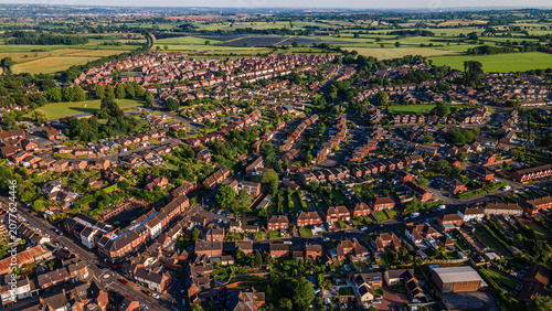 High angle aerial view of historic town center and residential streets in England