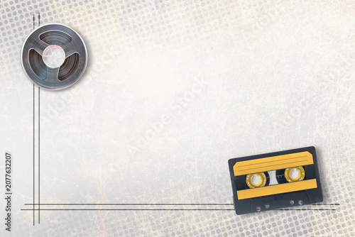 musical background with audio cassette and bobbin