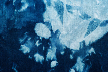 Macro view of blue tie dye fabric texture