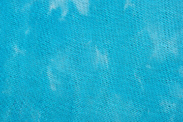 Macro view of blue tie dye fabric texture
