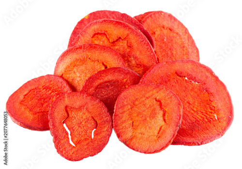 Crispy roasted carrot chips with sea salt, isolated on white background. Healthy and crunchy natural vegetable snack. Clipping path.