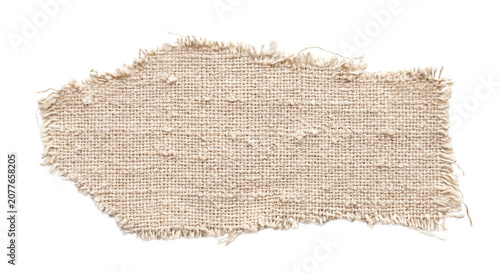 Konstfotografi Torn horizontal piece of natural beige burlap fabric