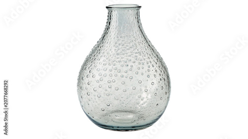 Empty elegant clear glass decanter or textured bud vase isolated on transparent background cut out