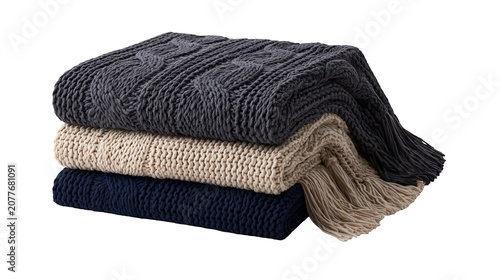Foto Stack of three chunky knit blankets in dark gray beige, and navy blue