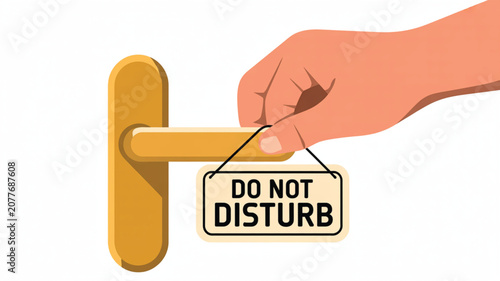 Hand holding a do not disturb sign attached to a yellow door handle indicating privacy required for guests staying in hotel rooms or offices.
