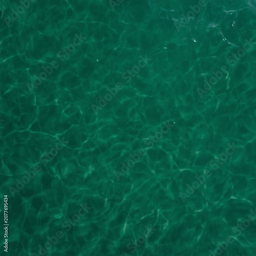 Emerald green water texture background