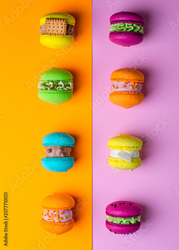 colored macaroons on a colored background, macaroons, dessert, French dessert, pastries
