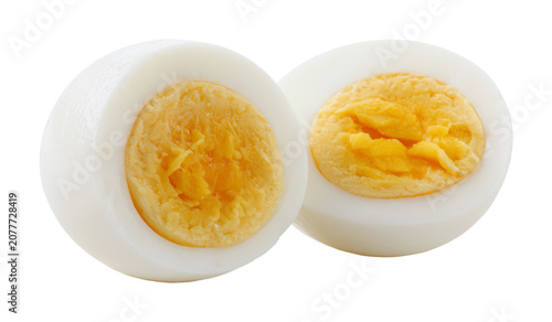 Принти на полотні Halved hard-boiled egg with visible yolk and white texture isolated on transpare
