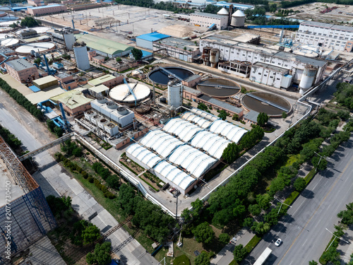 Fotografie Aerial view of industrial plant with wastewater treatment facilities and infrast