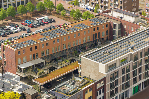 Aerial view of solar panels on apartment building roofs in Arnhem, The Netherlands