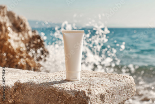 Blank White Sunscreen Tube Mockup with Ocean Waves Splashing on a Beautiful Summer Beach