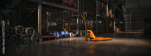 Принти на полотні Pallet jack in a large warehouse with high shelving units containing various items