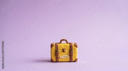 Cute Plasticine Travel Suitcase with Pastel Purple Copy Space