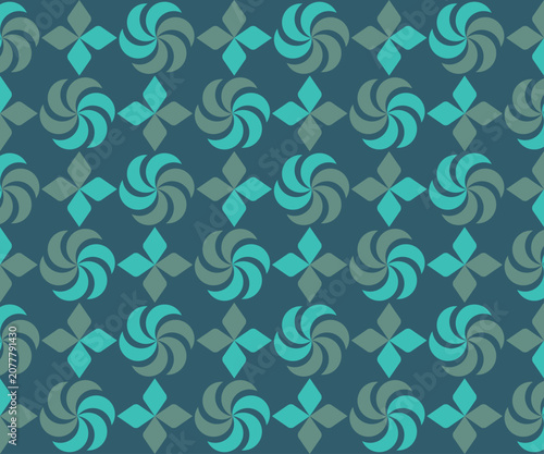 A stylish seamless pattern featuring repeating teal spinning floral motifs and dark green diamond accents on a deep blue background. Ideal for contemporary interior design and fashion textiles.