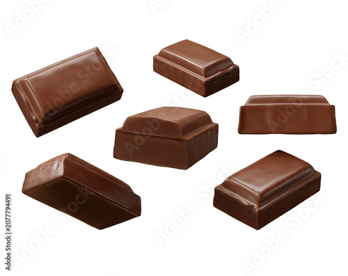 Milk chocolate pieces isolated on white background
