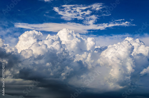 Dramatic Cumulus Cloudscape Against Vivid Blue Sky