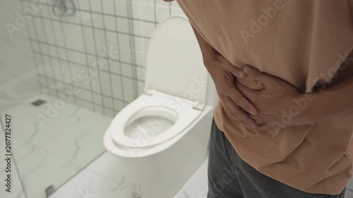 Constipation and diarrhea in bathroom. Hurt man touch belly  stomach ache painful. colon inflammation problem, toxic food, abdominal pain, abdomen, constipated in toilet, stomachache, Hygiene