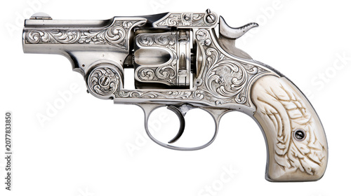 Engraved silver revolver with ornate ivory grips