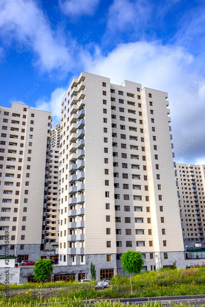 Fototapeta premium High-rise apartment buildings with balconies