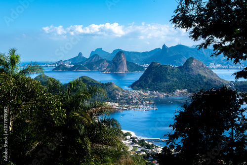 Tableau sur toile Stunning view of Rio de Janeiro from the City Park forest in Niterói, with Guanabara Bay, Sugarloaf Mountain, Pedra da Gávea and Corcovado in the background