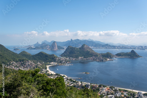 Stunning view of Rio de Janeiro from the City Park forest in Niterói, with Guanabara Bay, Sugarloaf Mountain, Pedra da Gávea and Corcovado in the background.