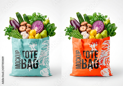 Tote bag filled with fresh groceries isolated on white background