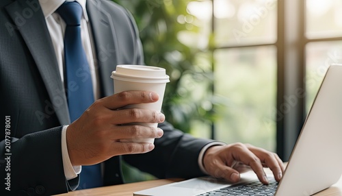 Businessman Working Laptop with Coffee in Office