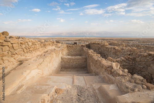 Ancient ritual bath (mikveh) at the archaeological site of Qumran overlooking the Dead Sea.