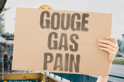 фотографія "Gouge gas pain" Fuel price surges cause financial distress