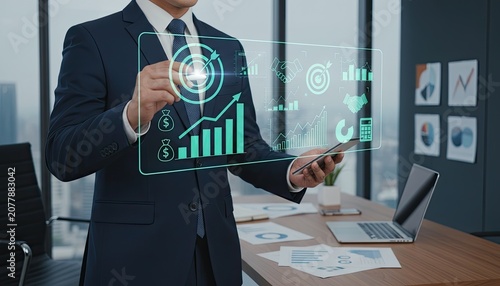 Businessman Interacting with Holographic Financial Data Display for Strategy