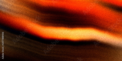 Fotografie Abstract fiery orange and dark brown wave pattern with grainy texture creating sense of heat and energy background