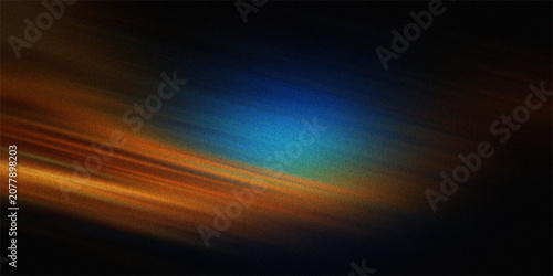 Принти на полотні Abstract motion blur background with bright blue light focal point surrounded by warm orange streaks on dark textured space