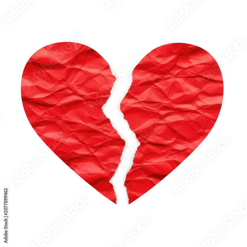 Broken red heart paper craft symbol of love and sadness