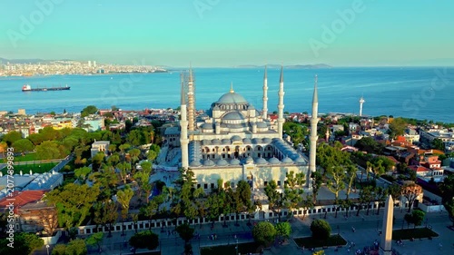 Aerial view of the Blue Mosque in Istanbul, Turkey. Sultanahmet Camii is surrounded by gardens, old city buildings and scenic Bosphorus coastline.