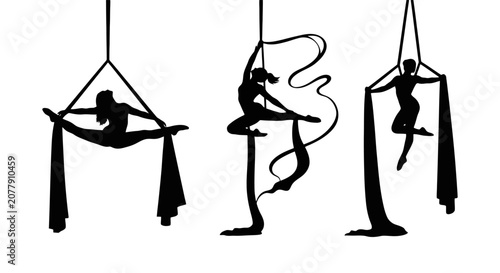 Bild auf Leinwand Three Aerial Silk Artists Performing Graceful Silhouette Dances.