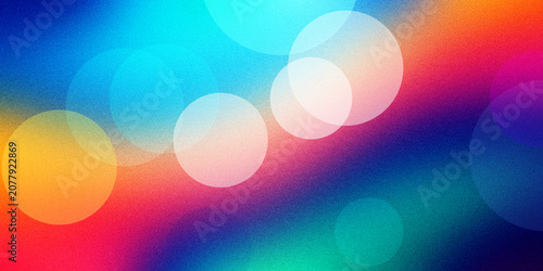 Obraz na plátne Colorful bokeh lights with soft circular glowing orbs on vibrant multicolored gradient background with grainy texture overlay