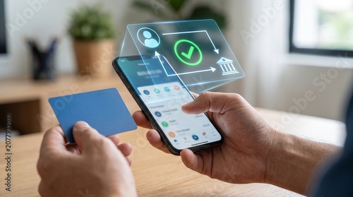 Digital banking user making an online payment with a smartphone and credit card at home during everyday life highlighting secure fintech solutions and cashless transactions.