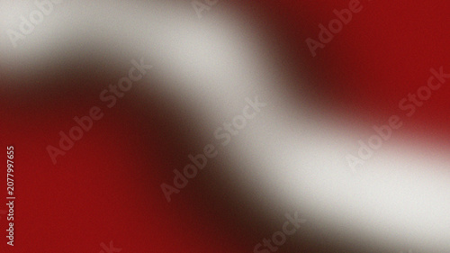 A vibrant red and white abstract background with a blurred gradient effect creating a dynamic visual