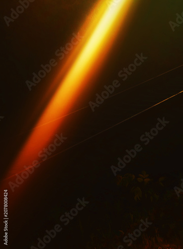 Diagonal ray of light on the railway track vertical orientation