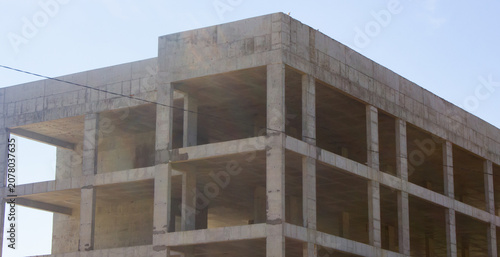 Authentic concrete structure, slab building. Reinforced concrete construction. Industrial concrete structure. Construction site.