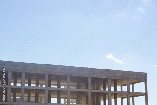Authentic concrete structure, slab building. Reinforced concrete construction. Industrial concrete structure. Construction site.