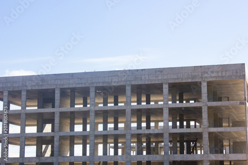 Authentic concrete structure, slab building. Reinforced concrete construction. Industrial concrete structure. Construction site.