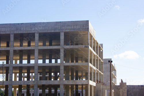 Authentic concrete structure, slab building. Reinforced concrete construction. Industrial concrete structure. Construction site.
