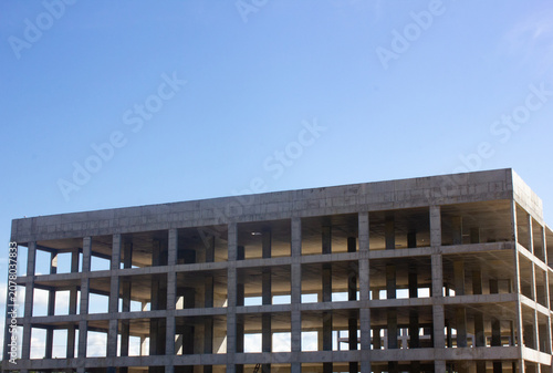 Authentic concrete structure, slab building. Reinforced concrete construction. Industrial concrete structure. Construction site.